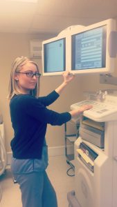 Dana at the fluoroscopy machine